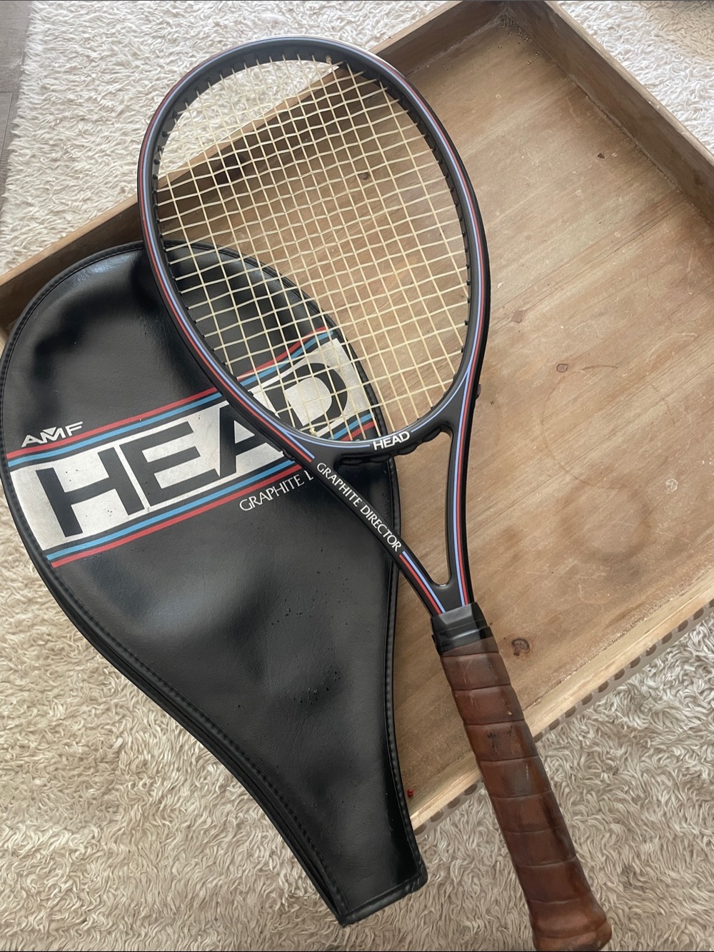HEAD Graphite Director Tennis Racket — Black with Red & Blue Accents